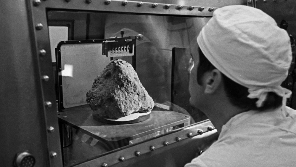 A scientist analyzing the rock sample “Big Bertha”. Photo: NASA